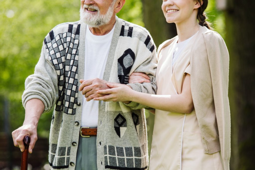 Caregiver and her patient in the nursing home